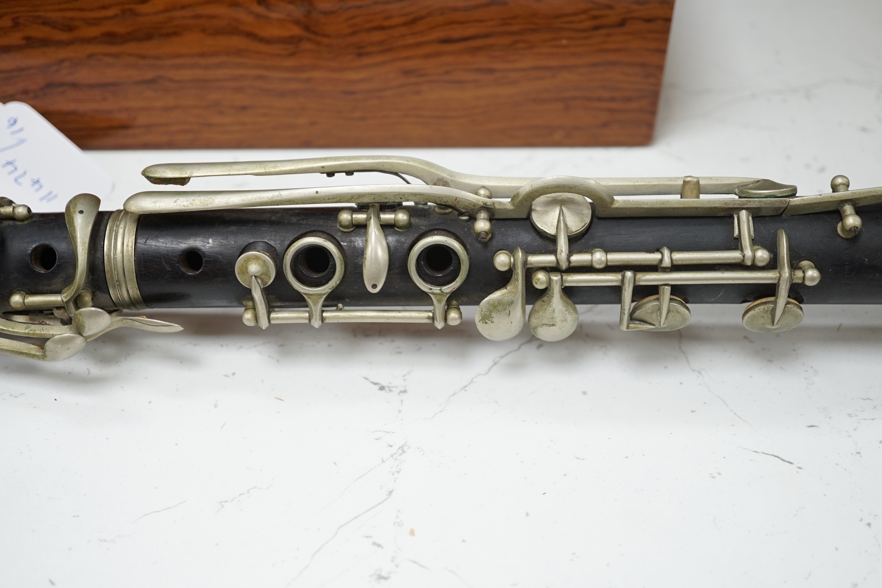 An unmarked wooden clarinet